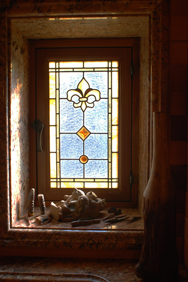 Fleur de lis leaded glass bathroom windows