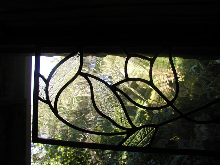 Clear leaded glass flowers and leaves transom window